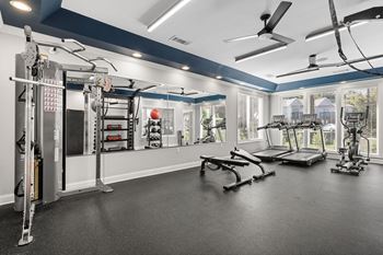 24-Hour fitness center with peloton bikes and echelon mirror